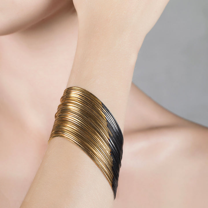 BRACCIALE MULTIFILO IN ORO BICOLORE