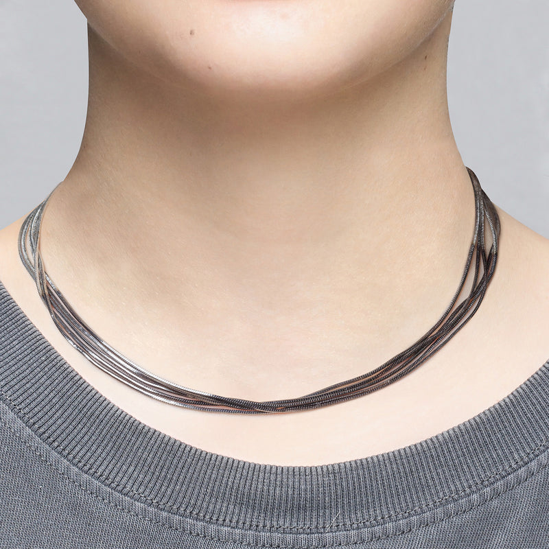 TWO-TONE GOLD-COLORED MULTI-STRAIN NECKLACE