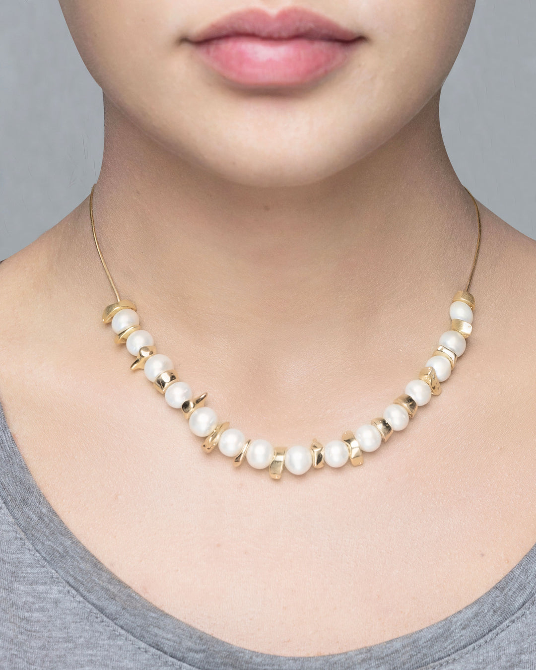 TWO-TONE GOLD-COLORED MULTI-STRAIN NECKLACE